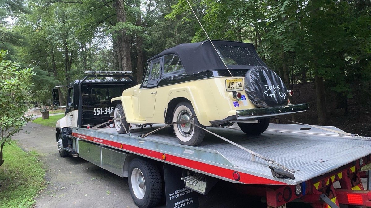 Collector vehicle transported by XXCELL Towing on a flatbed