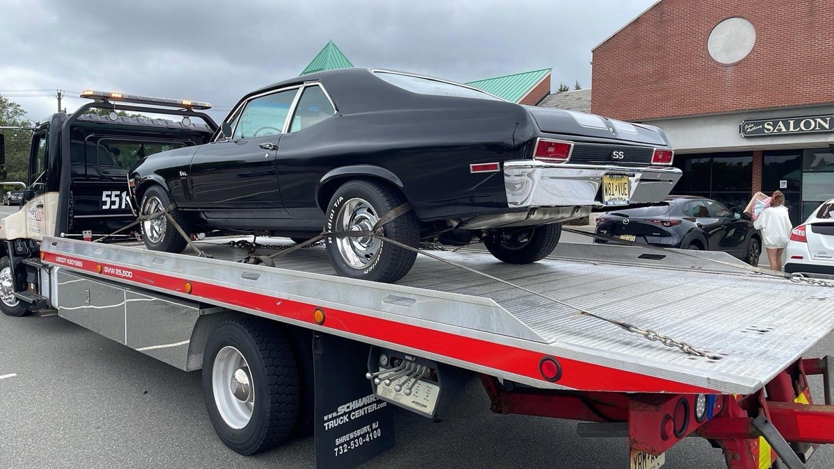 Classic car flatbed transport job by XXCELL Towing