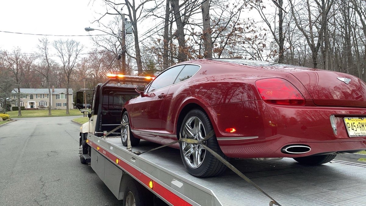 Classic Ferrari transported by XXCELL Towing on a flatbed