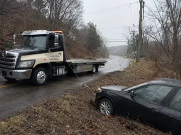 BMW winch-out recovery by XXCELL Towing in Bergen County NJ
