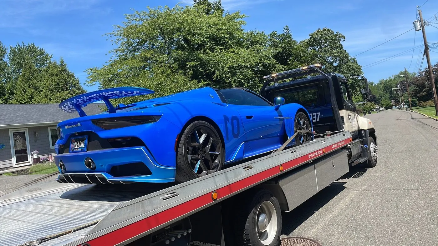 XXCELL Towing transporting a Maserati MC20 in Alpine NJ