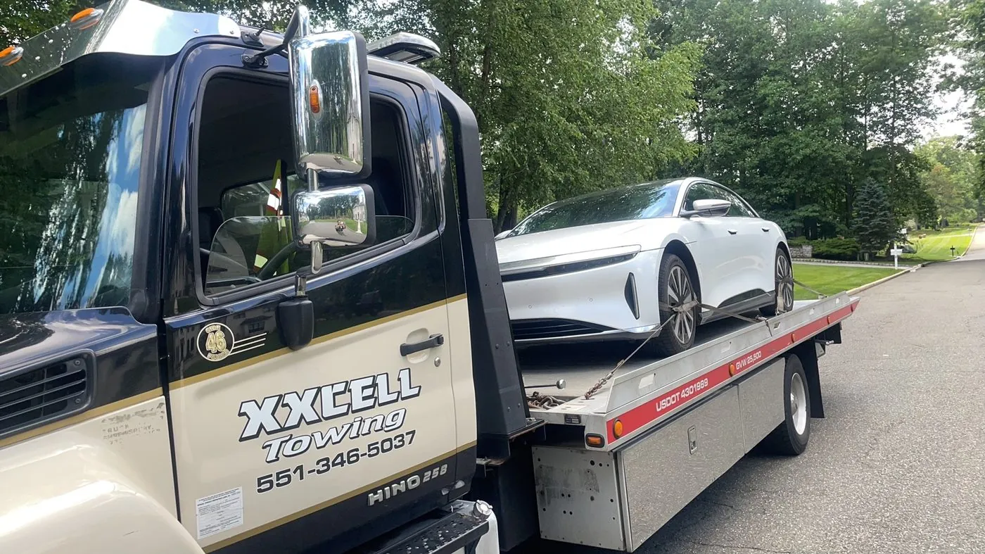 XXCELL Towing transporting a Lucid Air EV in Tenafly NJ