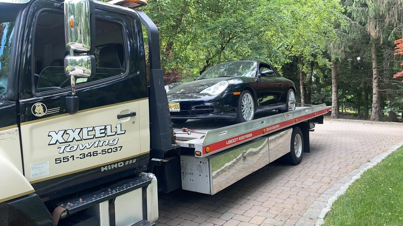XXCELL Towing transporting a Porsche 911 in Saddle River NJ