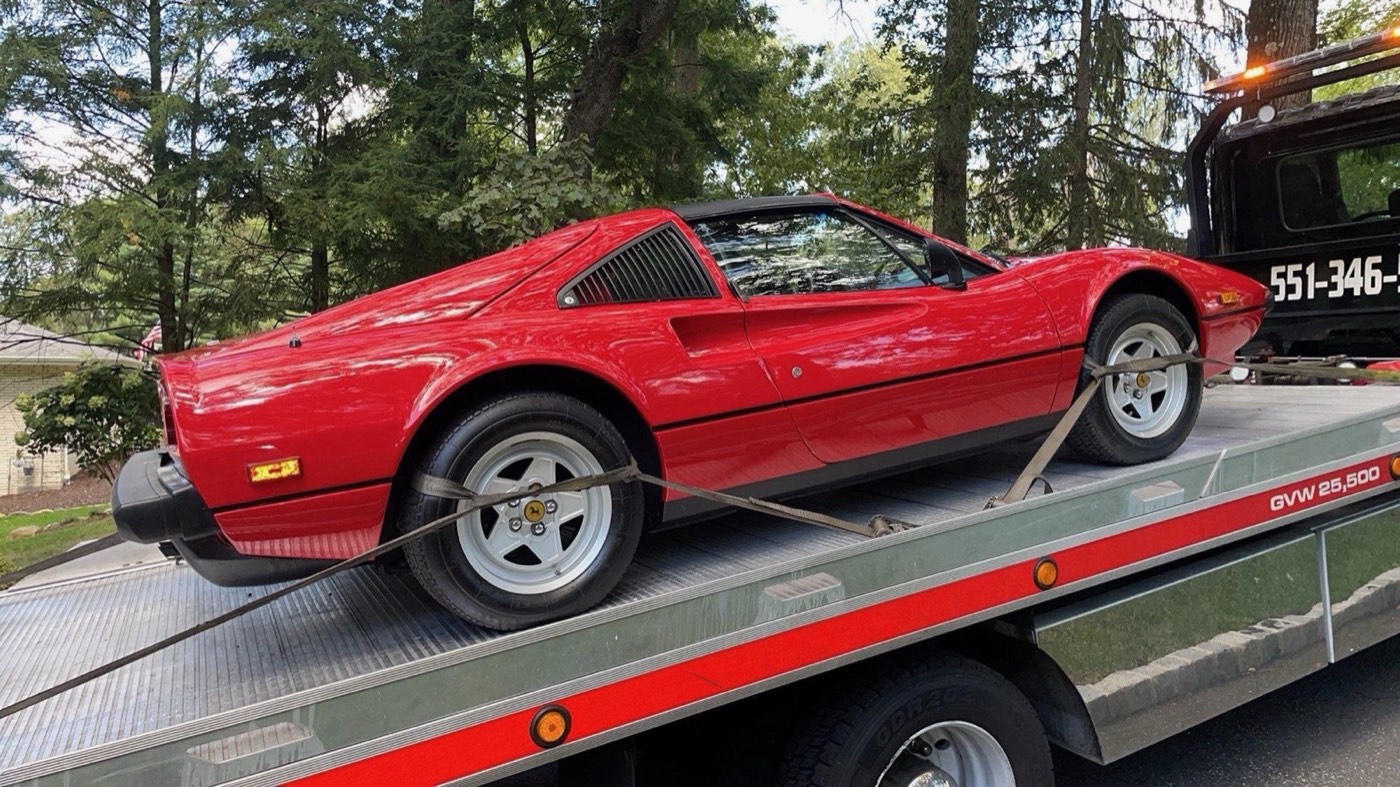 Classic Ferrari transported by XXCELL Towing on a flatbed